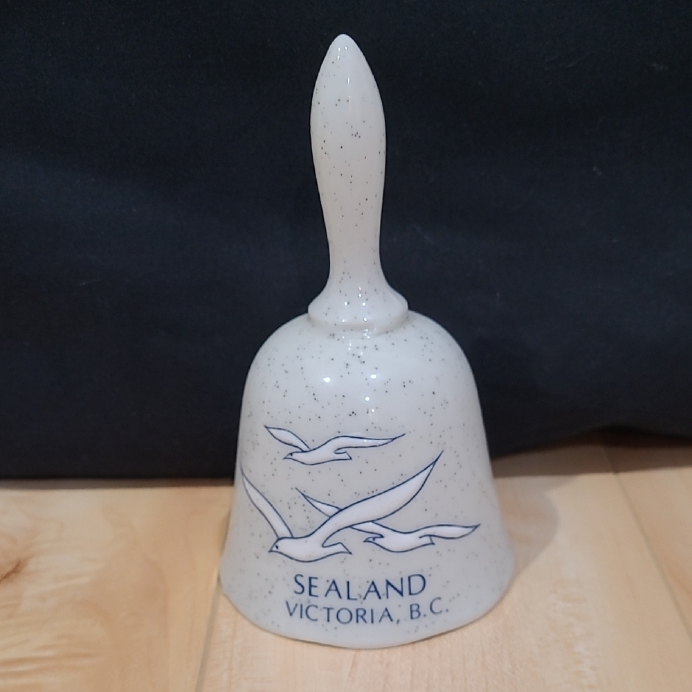 2/$20 Sealand, Victoria B.C. White Decorative Bell with Blue Accents